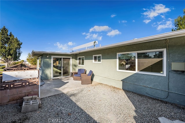 rear view of house with a patio area