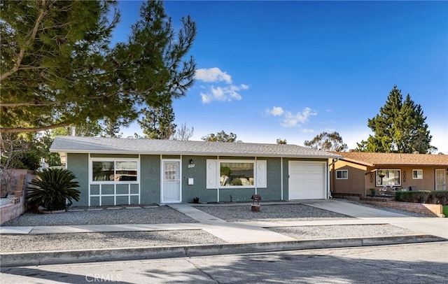 ranch-style home with a garage