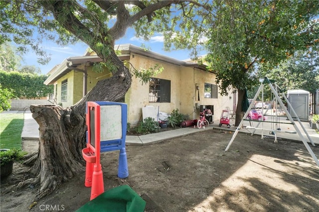 exterior space featuring a playground