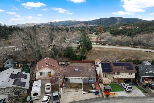 drone / aerial view featuring a mountain view