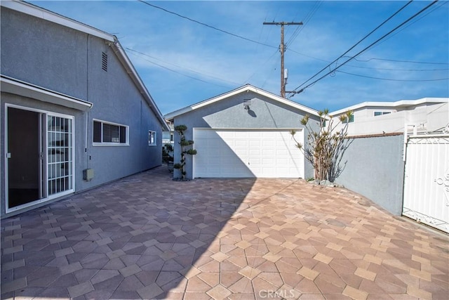 detached garage with fence