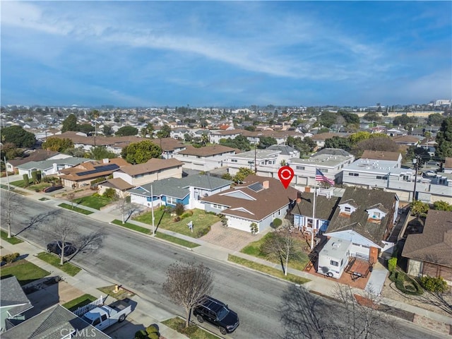 birds eye view of property with a residential view