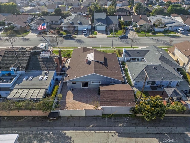 birds eye view of property with a residential view