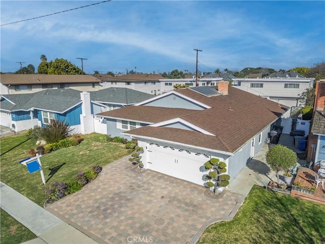 drone / aerial view featuring a residential view