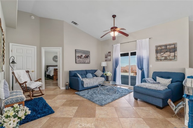 tiled living room featuring high vaulted ceiling and ceiling fan