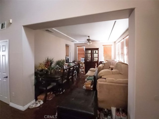 living room featuring ceiling fan