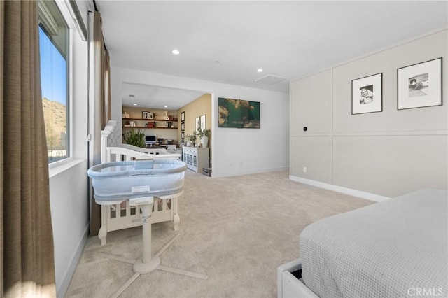 bedroom with light carpet, baseboards, and recessed lighting