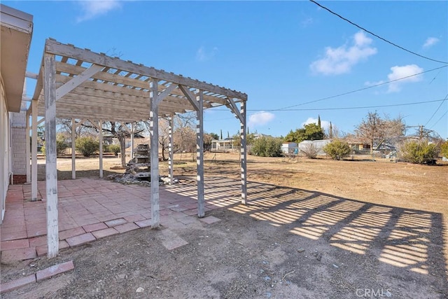 view of patio featuring a pergola