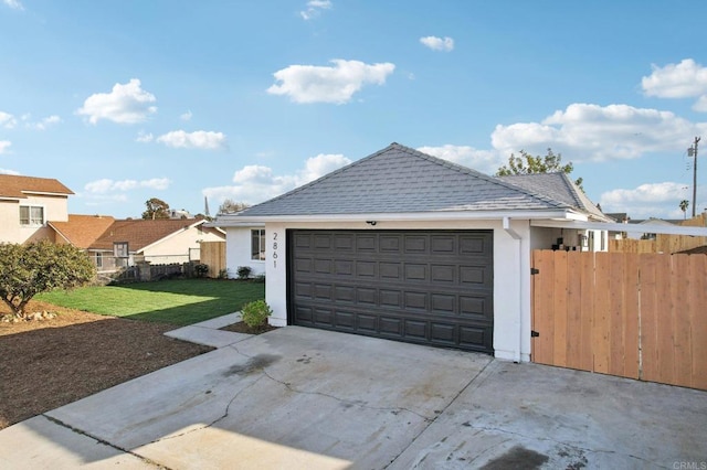 garage with a lawn