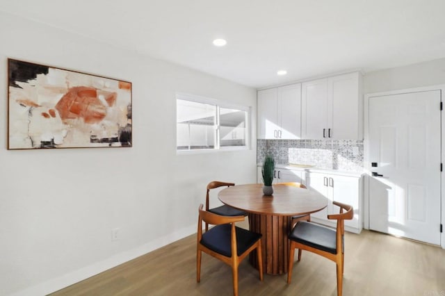 dining room featuring light hardwood / wood-style flooring