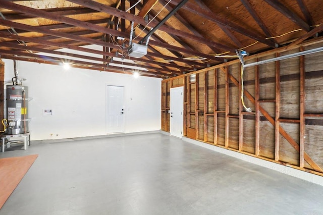 garage featuring a garage door opener and gas water heater