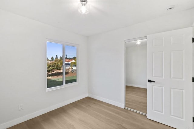 empty room featuring light wood-type flooring