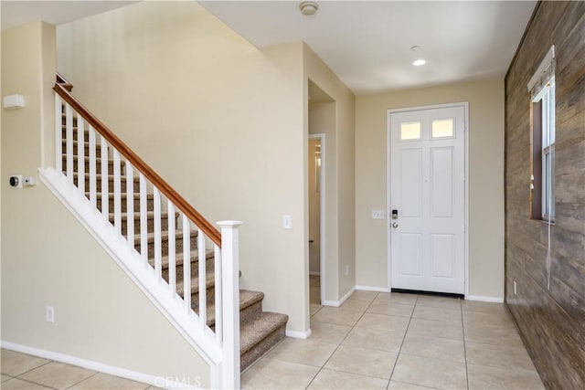 entrance foyer featuring light tile patterned floors