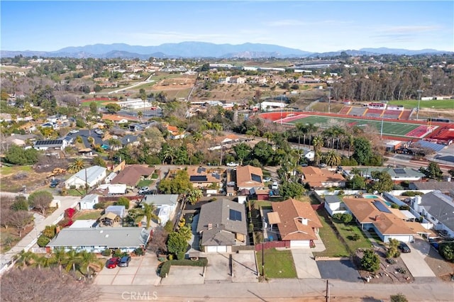 drone / aerial view featuring a mountain view