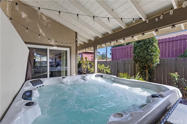 view of pool featuring a hot tub