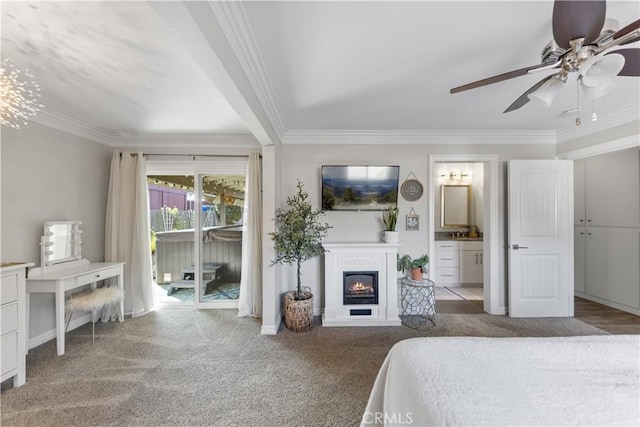 bedroom featuring carpet floors, access to exterior, crown molding, and connected bathroom