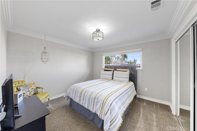 bedroom with crown molding and carpet floors