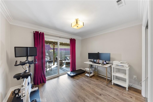 office space featuring hardwood / wood-style flooring and ornamental molding