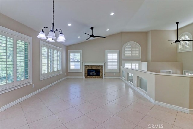 unfurnished living room featuring light tile patterned floors, ceiling fan, a high end fireplace, and recessed lighting