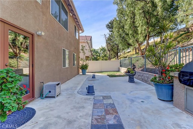 view of patio featuring a fenced backyard