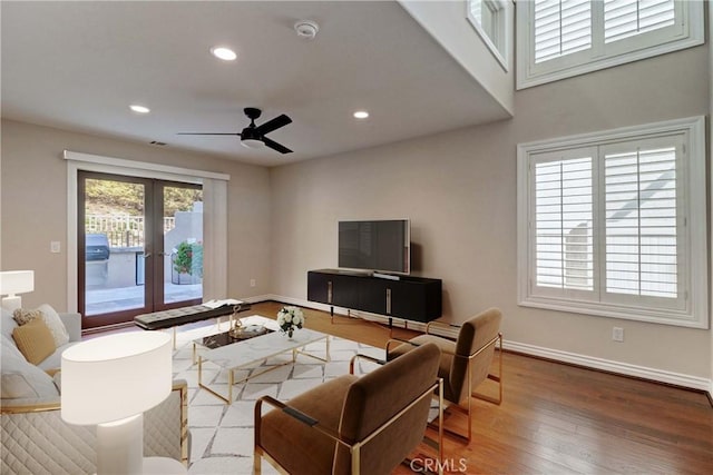 15 Embassy Pl, Lake Forest, CA 92610 - living room with french doors, ceiling fan, wood finished floors, and recessed lighting