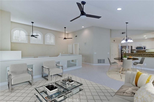 15 Embassy Pl, Lake Forest, CA 92610 - living area with a ceiling fan, recessed lighting, vaulted ceiling, and a chandelier