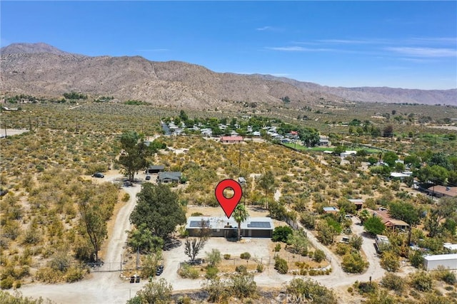 drone / aerial view featuring a mountain view