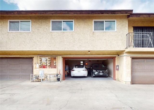 11214 Fineview Unit 5, El Monte, CA 91733 - exterior space featuring an attached garage and stucco siding