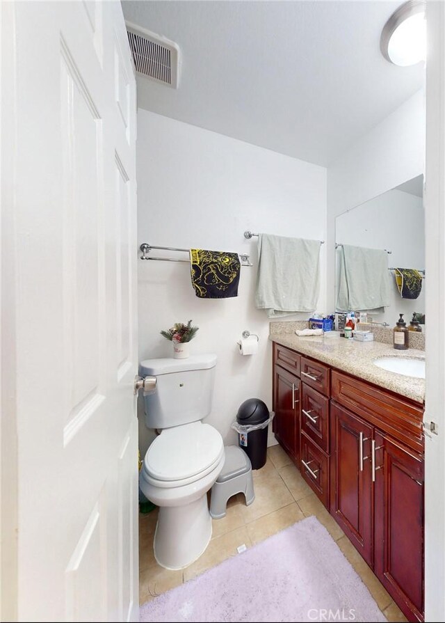 11214 Fineview Unit 5, El Monte, CA 91733 - full bath with double vanity, visible vents, toilet, and tile patterned floors