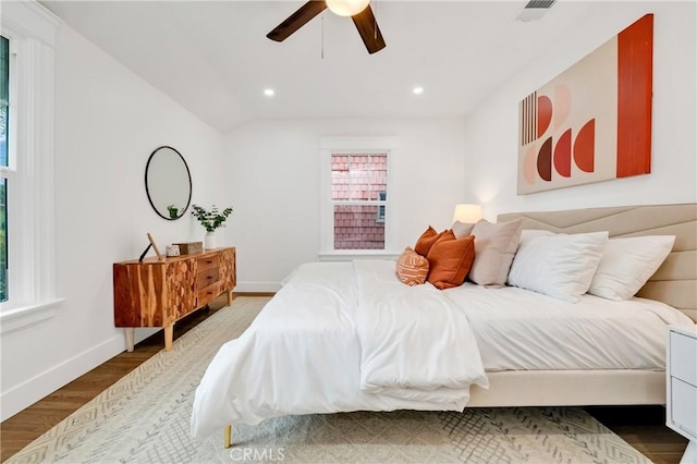 bedroom featuring recessed lighting, visible vents, ceiling fan, wood finished floors, and baseboards