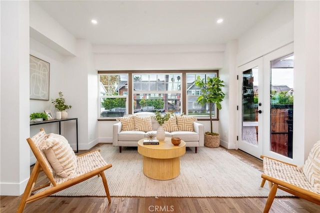 sunroom featuring french doors