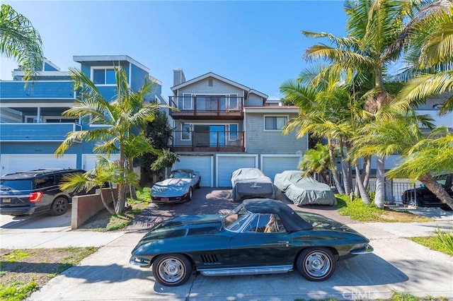 view of front of property featuring driveway and an attached garage