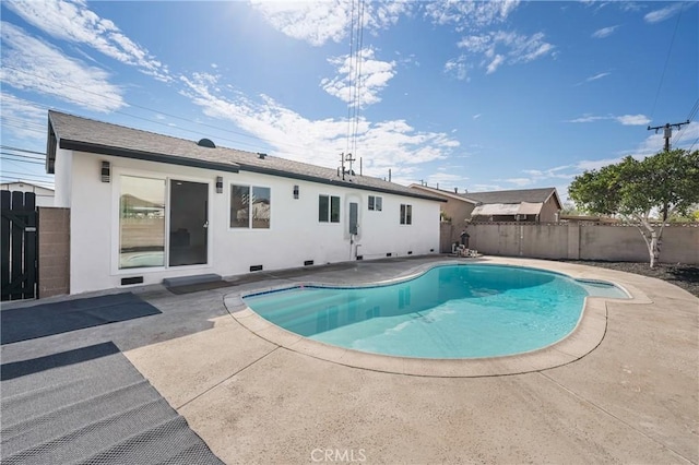 view of pool featuring a fenced in pool, a patio area, and a fenced backyard