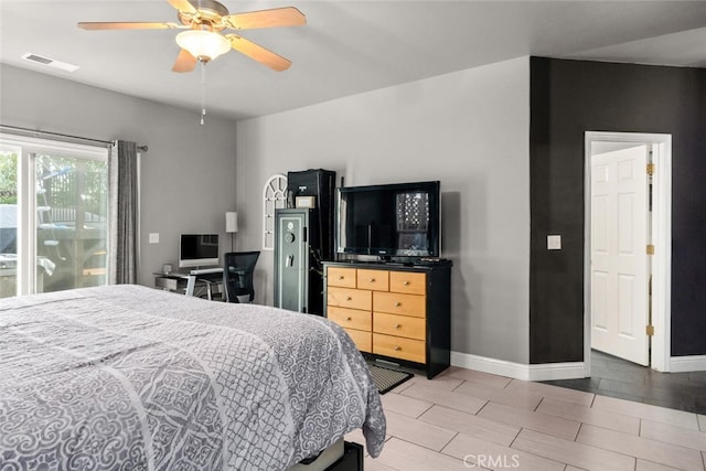 bedroom featuring baseboards, visible vents, a ceiling fan, wood tiled floor, and access to outside