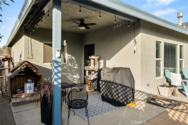 view of patio / terrace with a ceiling fan