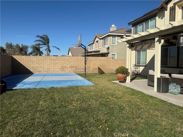 view of yard with a patio area and a fenced backyard