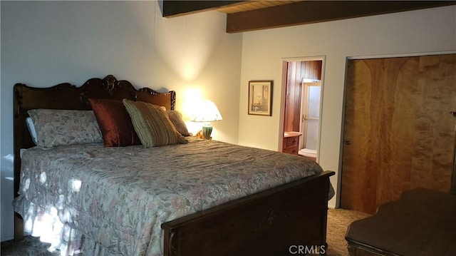 1239 Yosemite Dr, Lake Arrowhead, CA 92352 - bedroom with beamed ceiling, carpet, and ensuite bath