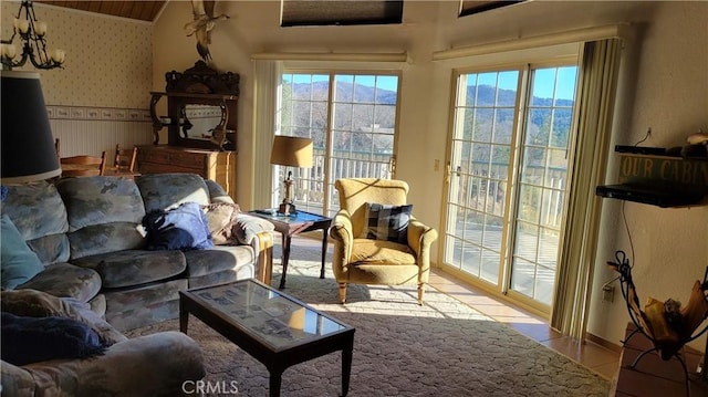 1239 Yosemite Dr, Lake Arrowhead, CA 92352 - living room with wallpapered walls, a mountain view, and water heater