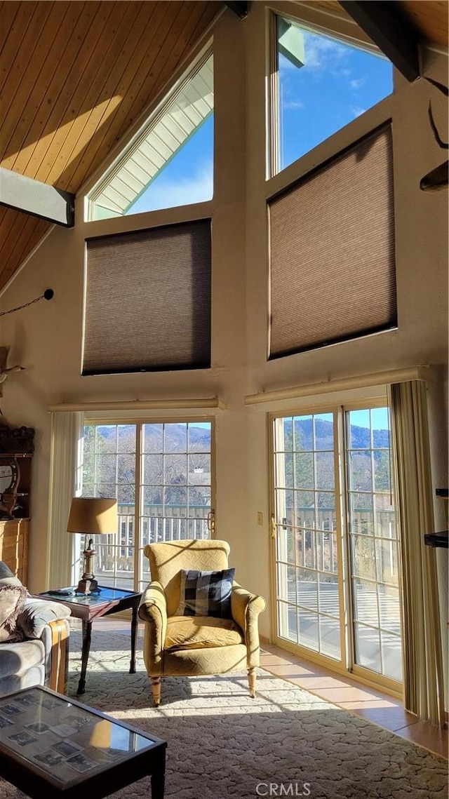 1239 Yosemite Dr, Lake Arrowhead, CA 92352 - living room with high vaulted ceiling, plenty of natural light, and beam ceiling
