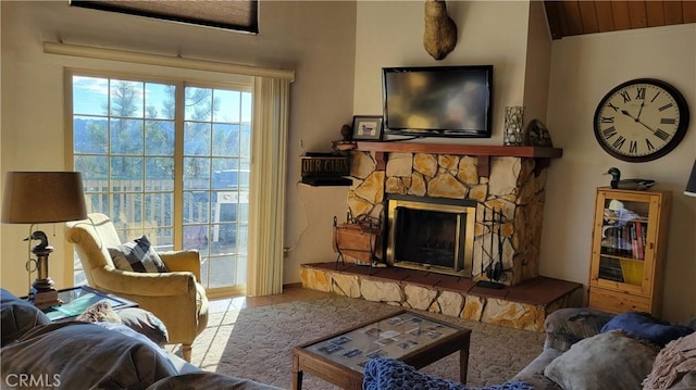 1239 Yosemite Dr, Lake Arrowhead, CA 92352 - living room featuring a stone fireplace