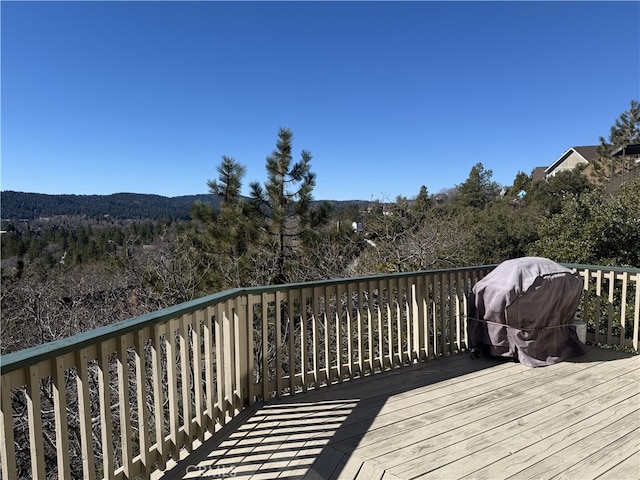 1239 Yosemite Dr, Lake Arrowhead, CA 92352 - wooden terrace featuring a wooded view