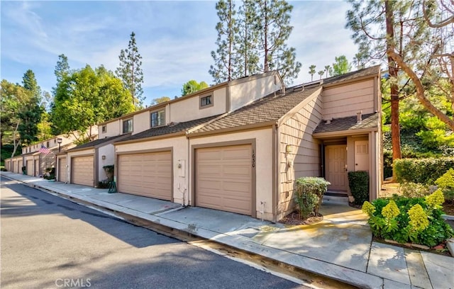 front of property with a garage