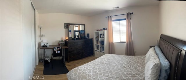 bedroom featuring hardwood / wood-style floors