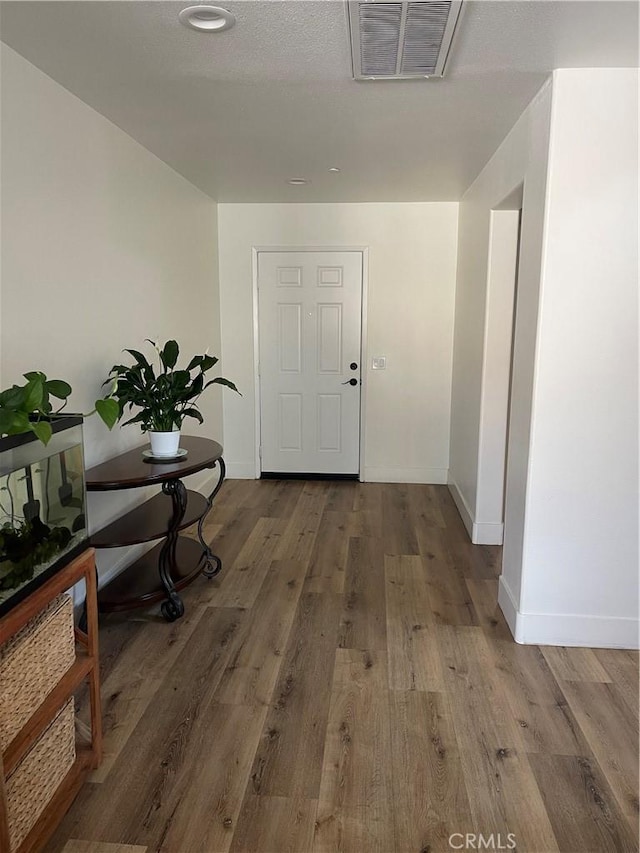 hall featuring wood-type flooring