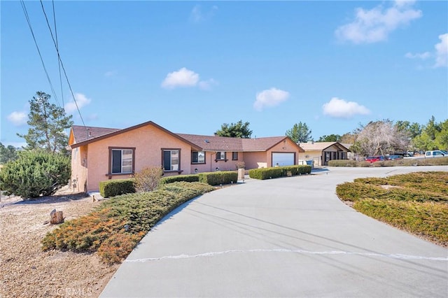 single story home with a garage