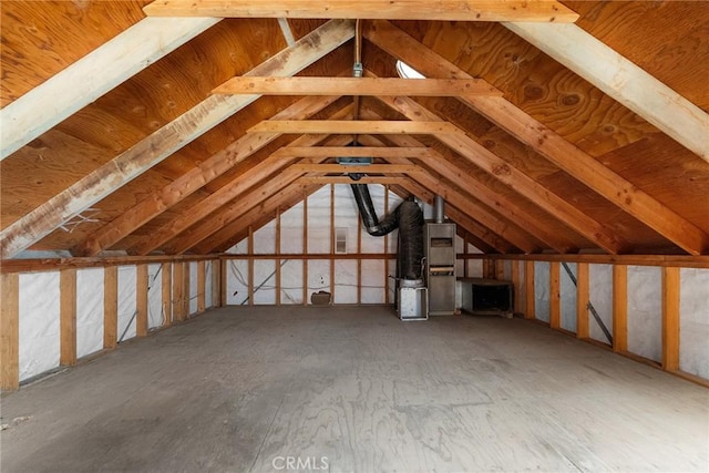 attic featuring heating unit