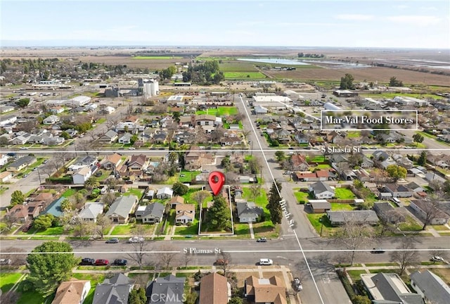 birds eye view of property with a residential view