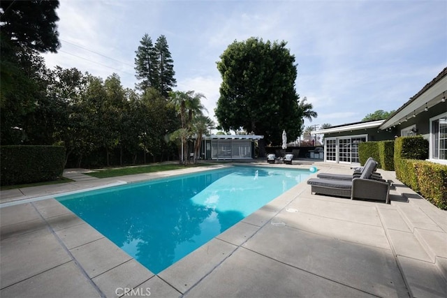 view of pool with a patio and a fenced in pool