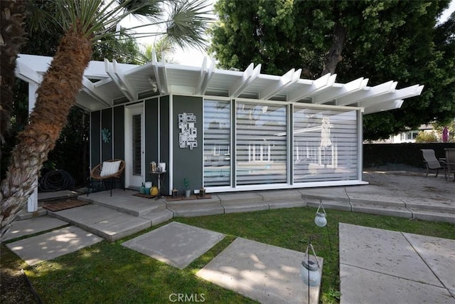 exterior space with a patio area and fence