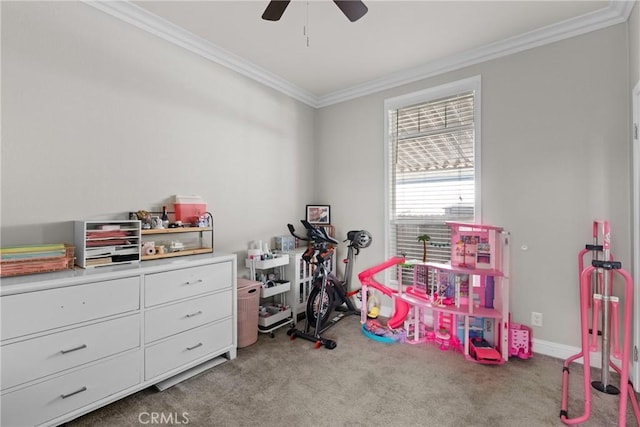 playroom featuring light carpet, ceiling fan, and ornamental molding